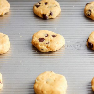 Chocolate chip cookies on a baking sheet.