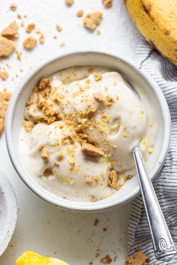 A bowl of food with a spoon.