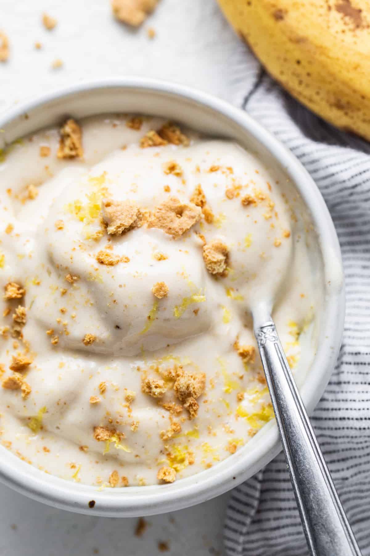 A bowl of food with a spoon.