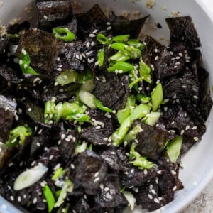 Black sesame tofu in a bowl.