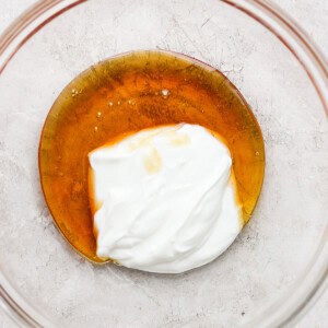 Whipped cream in a glass bowl.