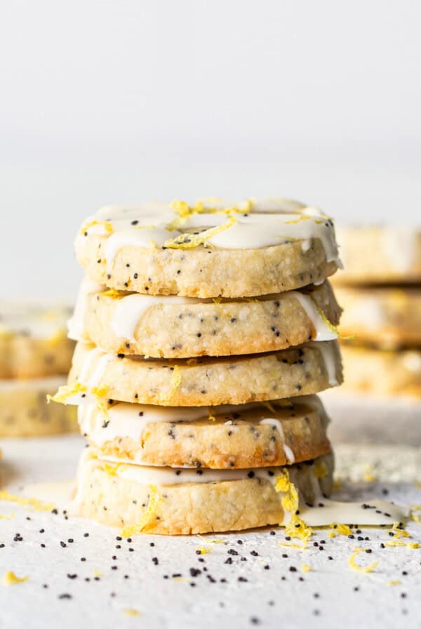 Lemon poppy seed cookies with icing and sprinkles.