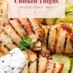 Grilled chicken thighs served with dill pickles and a creamy sauce, suggested as a healthy lunch option.