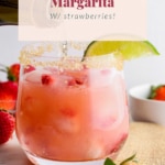 Refreshing champagne margarita served with strawberries.