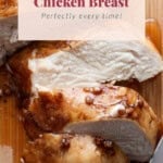 Sliced baked chicken breast on a wooden cutting board with text overlay "How to Bake Chicken Breast Perfectly every time!.