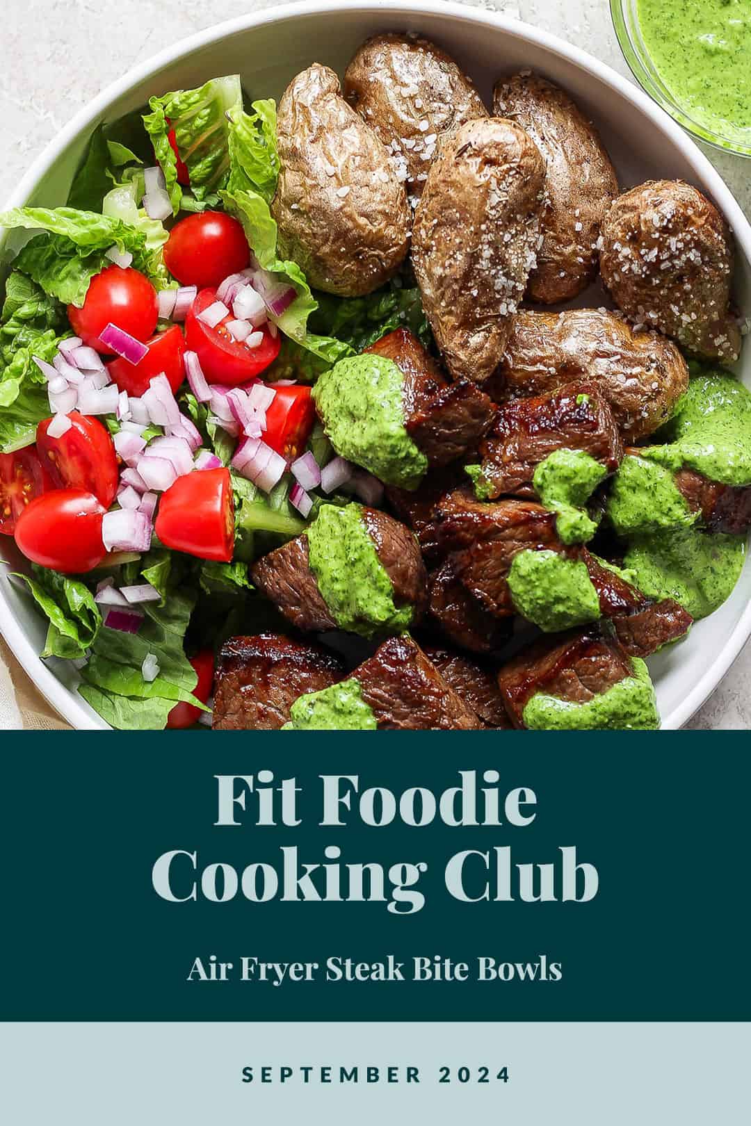 A bowl with steak bites, roasted potatoes, salad, and green sauce. Text at the bottom reads: "Fit Foodie Cooking Club - Air Fryer Steak Bite Bowls - September 2024.